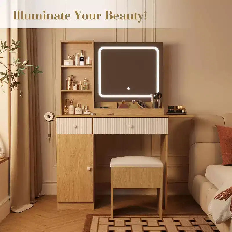Vanity with mirror and light, featuring drawers and a padded stool, equipped with power outlets, suitable for bedrooms and living rooms.